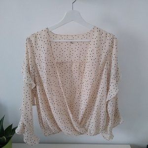 Cream polka dot blouse with ruffles